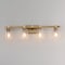 Maxim Lighting Cubos 4-Light Bath Vanity, Natural Aged Brass 21384CLNAB - alternate 2